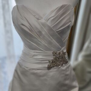 Elegant Cream Satin Wedding Dress with Embellished Detail